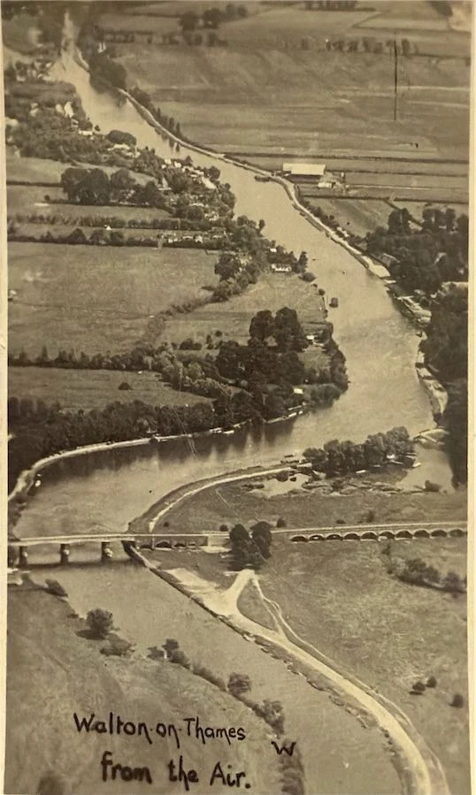 Vintage aerial photograph captioned 'Walton-on-Thames from the Air', showing Walton Bridge crossing the Thames surrounded by open fields, probably taken during the 1920s
